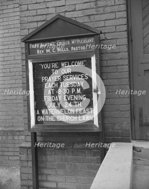 Sign in front of a church, Washington, D.C., 1942. Creator: Gordon Parks.