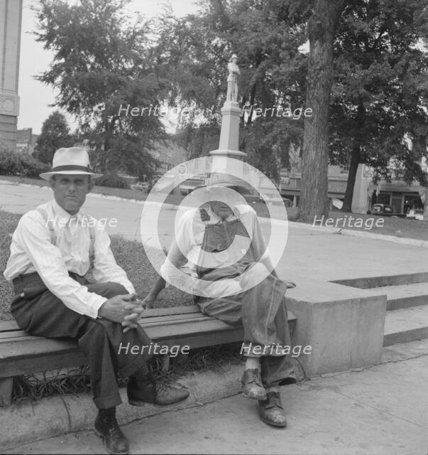 Farmer in town idling around the county courthouse, Person County, Roxboro, North Carolina, 1939. Creator: Dorothea Lange.