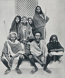 Group of Danakil men and women from the Italian port, Assab Bay, Eritrea, 1912. Artist: Unknown.