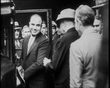 Alphonse Gabriel Capone AKA 'Al Capone' Entering a Car Watched by a Small Crowd, 1930. Creator: British Pathe Ltd.