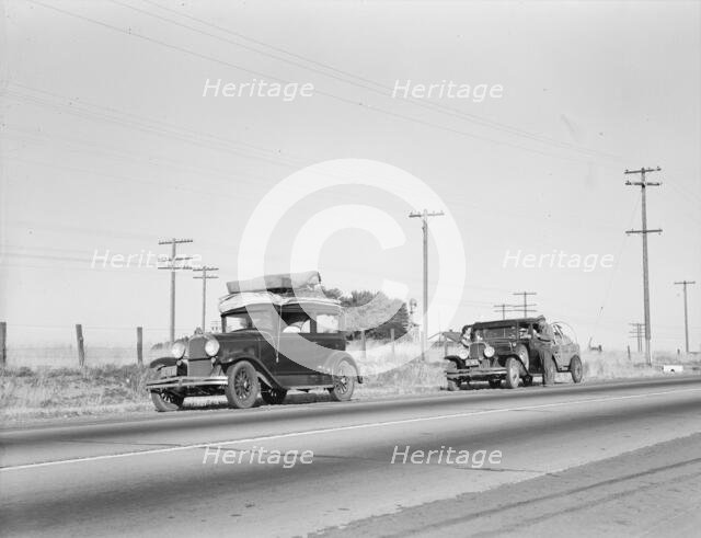 Two families originating from Independence, Kansas, U.S. 99, between Tulare and Fresno, 1939. Creator: Dorothea Lange.