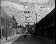 A Street is Decorated With Bunting For the Coronation of George VI, 1937. Creator: British Pathe Ltd.