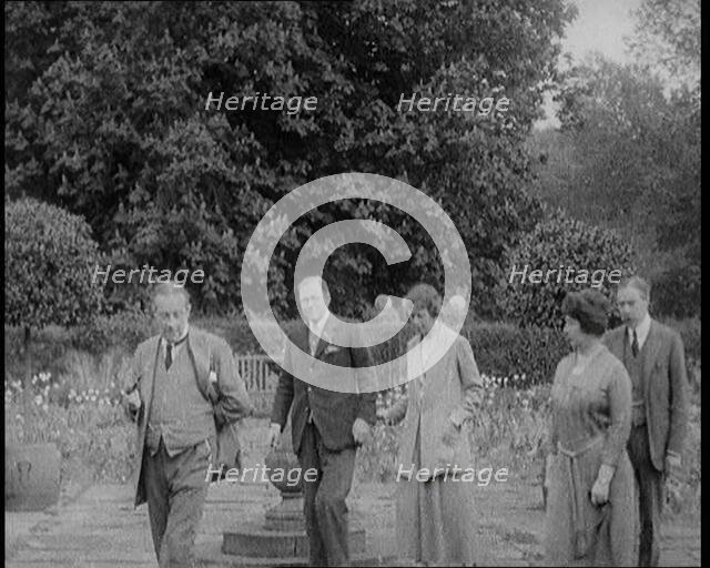 British Prime Minister Stanley Baldwin Walking in the Garden at Chequers, the Country House..., 1924 Creator: British Pathe Ltd.