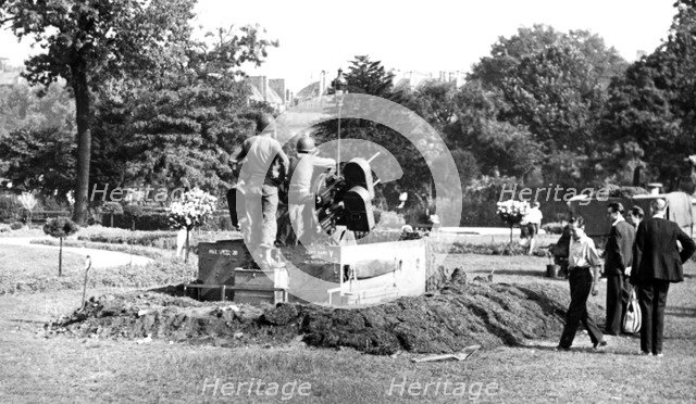 Anti-aircraft gun position in the Garden of the Tuileries, liberation of Paris, August 1944. Artist: Unknown