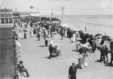 Asbury - Board walk & esplanade review, 1911. Creator: Bain News Service.