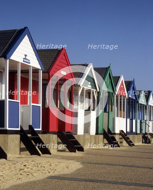 A row of eight colourful beach huts, Southwold, Suffolk, c2000s(?).  Artist: Unknown.