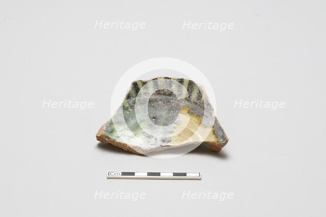 sherd, red body, white slip, yellow, green, black glaze, Mamluk period, 1250-1516. Creator: Unknown.
