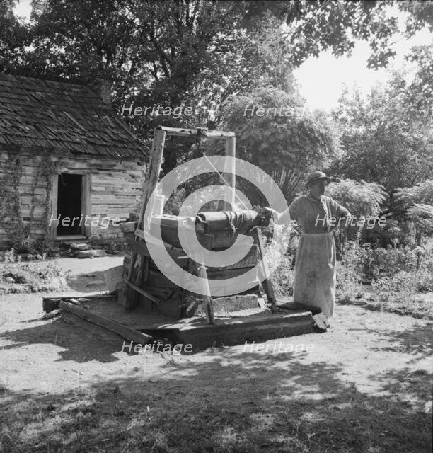 Caroline Atwater, wife of Negro owner, tells how they got their place, 1939. Creator: Dorothea Lange.
