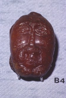 Amber Head of a Bearded Man, Viking Period, from Denmark, c8th-mid 11th century. Artist: Unknown.