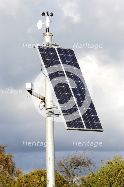 Solar Panel powering roadside equipment. Artist: Unknown.