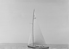The 6 Metre class 'Sheila' (US4) sailing upwind, 1921. Creator: Kirk & Sons of Cowes.
