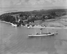 Montague Grahame-White's steam yacht 'Alacrity' and Brownsea Island, Dorset, from the east, 1933. Artist: Aerofilms.