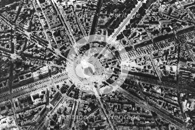 A bird's eye view of the Place de L'Etoile and the Arc de Triomphe, Paris, 1931. Artist: Ernest Flammarion