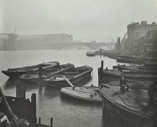 Barges moored at Bankside wharves looking downstream, London, 1913.  Artist: Unknown.