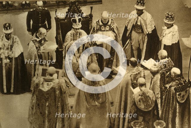 'The Crowned King George VI Seated on the Coronation Chair', 1937. Creator: Photochrom Co Ltd of London.