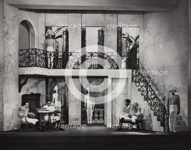 Three men sitting, others on guard, 1938. Creator: Unknown.