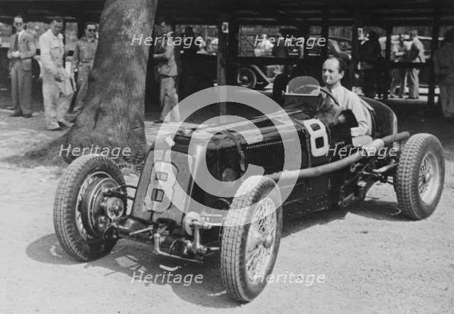 Raymond Mays in his 1.5 litre ERA, Donington,1937. Artist: Unknown