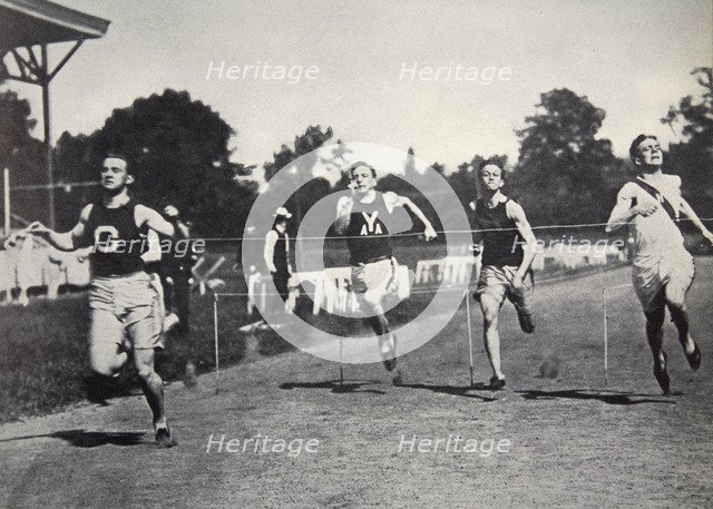 Arthur Duffey, American athlete, running a race, 1902. Artist: Edwin Levick