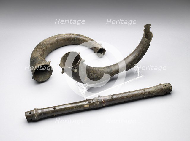 Trumpets and trumpet tube, Bronze Age (Britain), (c2500 BC-c800 BC). Artist: Unknown.