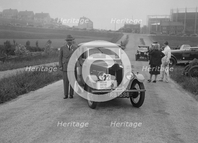 Wolseley Hornet saloon of DEM Douglas-Morris at the B&HMC Brighton Motor Rally, 1930. Artist: Bill Brunell.