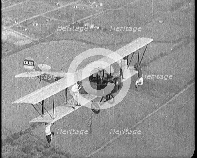 Jazz Musicians Playing from the Wing of a Biplane in the Air, 1921. Creator: British Pathe Ltd.
