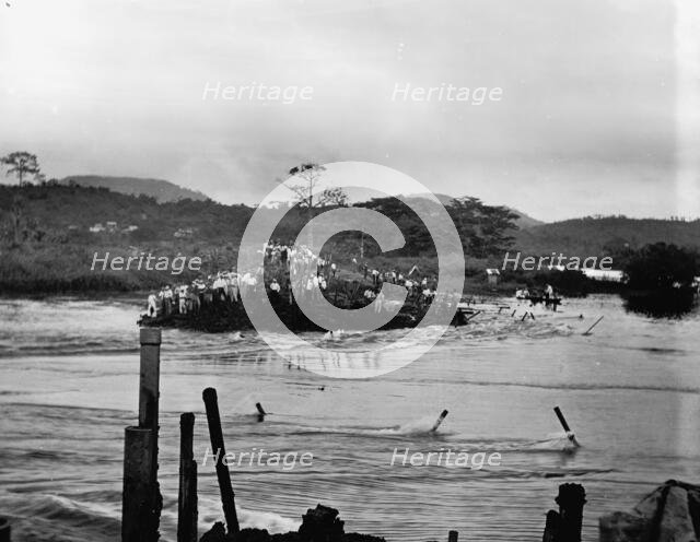 First rush of water through Gamboa dyke, Panama Canal, c.between 1910 and 1914. Creator: Unknown.