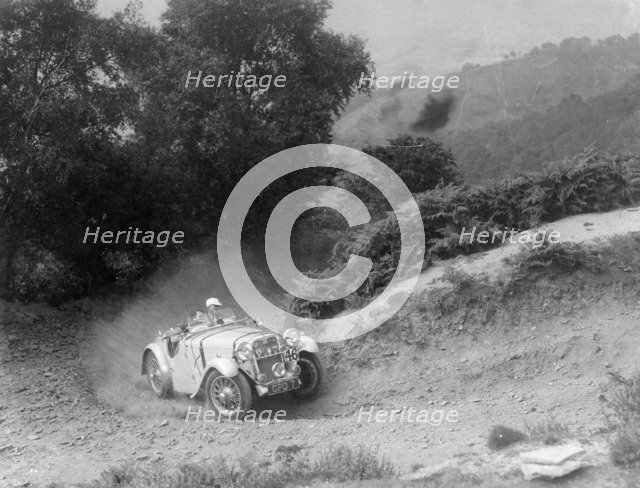 A Singer Nine taking part in the Barnstaple Trial, Barnstaple, Devon, 1935. Artist: Unknown