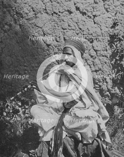 Algerian native flute player, 1912. Artist: Unknown.