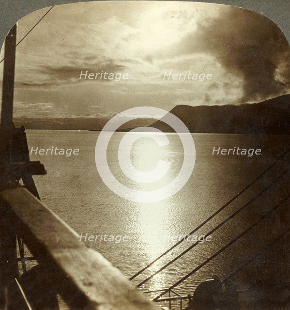 'The Midnight Sun in July over cliffs of Spitzbergen and Arctic Ocean', c1905. Creator: Unknown.