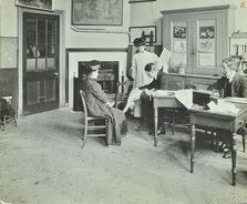Medical examination, Holland Street School, London, 1911. Artist: Unknown.