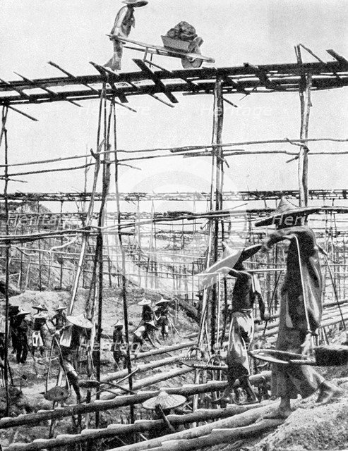 Primitive methods in the world's richest tin district, Taiping, China, 1936.Artist: Ewing Galloway