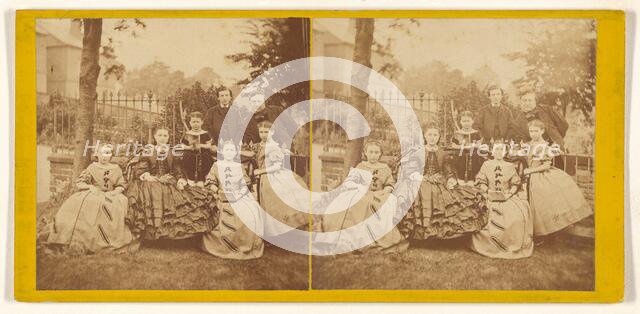 Family portrait outside in backyard, about 1870. Creator: Unknown.