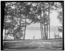 A glimpse of Mirror Lake, Adirondack Mountains, c1902. Creator: William H. Jackson.