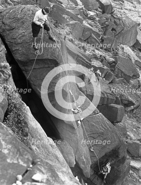Climbers on Stanage Edge, Hathersage, Derbyshire, 1964.  Artist: Michael Walters