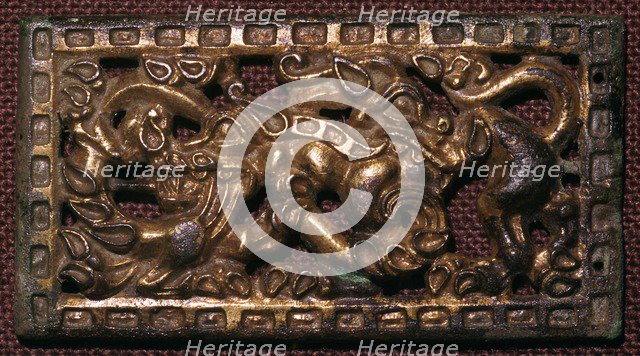 Chinese bronze belt-buckle with animals in combat, 5th century BC. Artist: Unknown