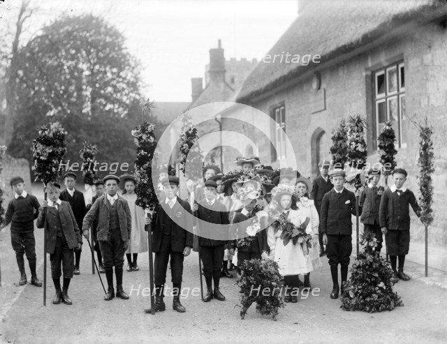 A group of children on May Day with May King and Queen centre right, Oxford, Oxfordshire, c1900. Artist: Henry Taunt