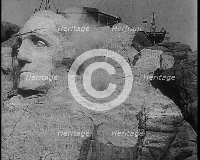 External Shot of Mount Rushmore Showing a Sculpture of American President George Wash..., 1933. Creator: British Pathe Ltd.