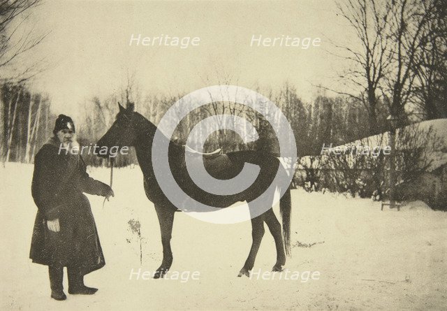 Russian author Leo Tolstoy with a horse, Yasnaya Polyana, near Tula, Russia, 1905.  Artist: Sophia Tolstaya