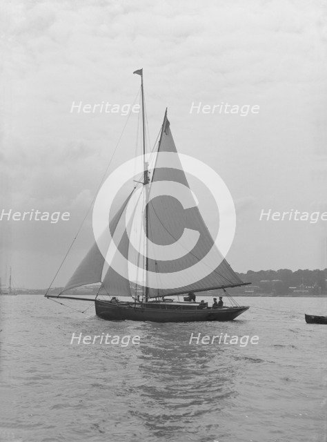 The gaff rigged cutter 'Wych' under sail, 1914. Creator: Kirk & Sons of Cowes.