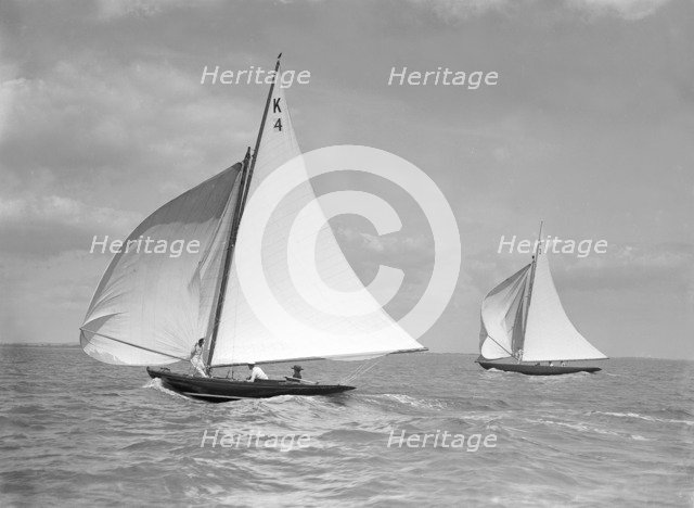 The 7 Metre 'Anitra' (foreground) and 'Nelta', on downwind leg, 1911. Creator: Kirk & Sons of Cowes.