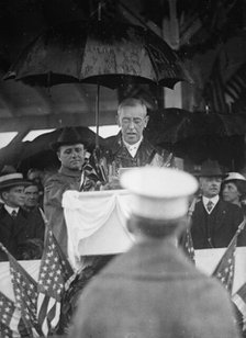 Flag Day - Wilson Making Address in Rain. Lansing 2nd from Right, 1917. Creator: Harris & Ewing.