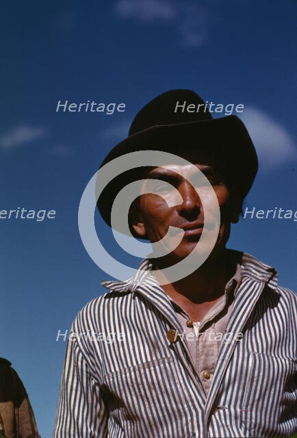 Migratory worker, FSA ... camp, Robstown, Tex., 1942. Creator: Arthur Rothstein.