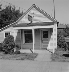On main street in center of town, Tenino, Thurston County, Western Washington, 1939. Creator: Dorothea Lange.
