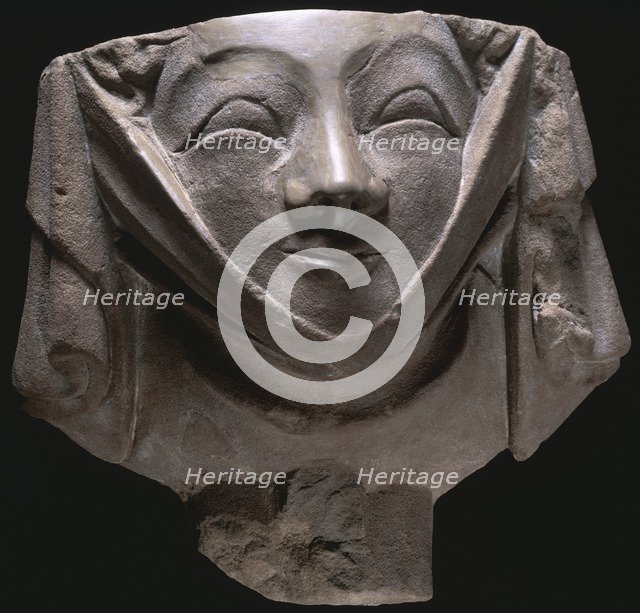 Stone corbel in the shape of a smiling nun, medieval, 14th century. Artist: Unknown