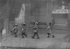 Pigtail parade, Chinatown, San Francisco, between 1896 and 1906. Creator: Arnold Genthe.
