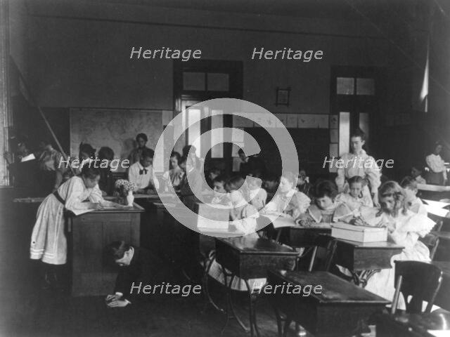 Rainy day activities in school - decorating the classroom, (1899?). Creator: Frances Benjamin Johnston.