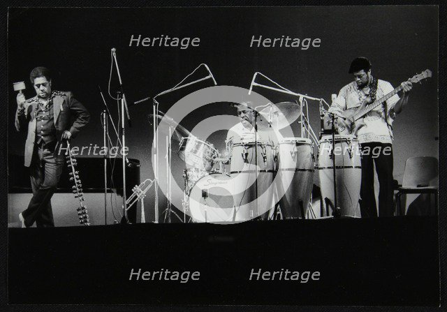 Dizzy Gillespie and guitarist Rodney Jones on stage, Beaulieu, Hampshire, July 1977. Artist: Denis Williams