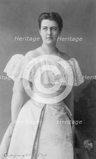 Mrs. Frances Folsom Cleveland, three-quarter-length portrait, standing, facing left, c1897. Creator: Frances Benjamin Johnston.