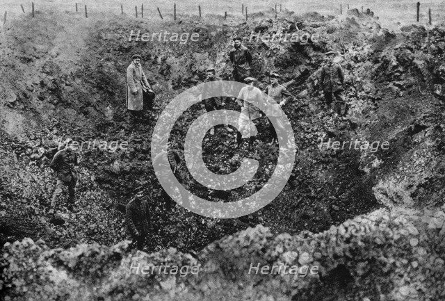 A crater caused by the explosion of a mine, Western Front, 1917. Artist: Unknown