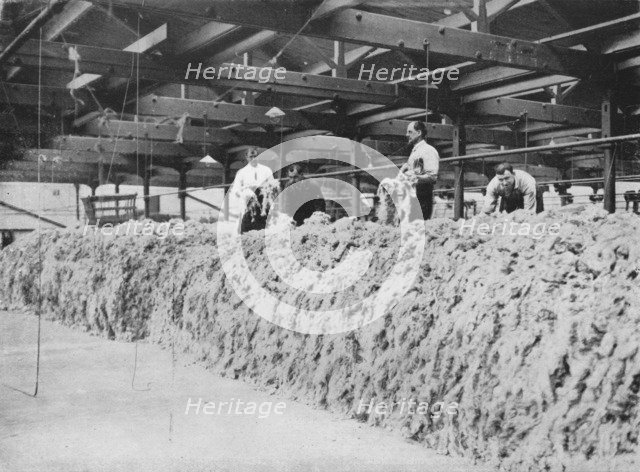 'The making of khaki - Wool blending', 1915. Artist: Unknown.